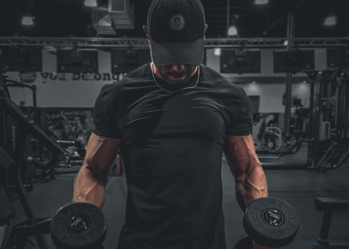 Athletes training in professional gym environment